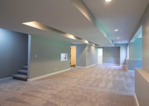 Green Finished basement with carpeting