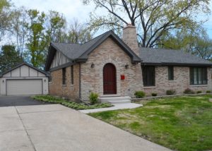 Whole house remodel - outside, new brick front, entry addition and garage
