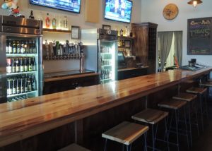Commercial renovate - expanded the take-out service to include a dine in area with a bar