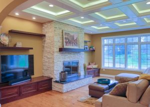 First Floor Living Room with Coffered Ceiling and brick fireplace