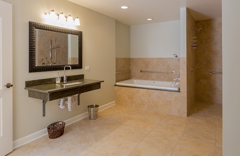 Lower Level Accessible Bathroom with tub and shower