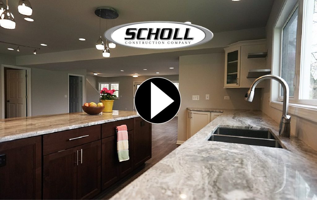 custom kitchen with chocolate-colored shaker cabinets and granite countertops
