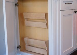 Custom cabinet detail showing book racks