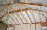 green construction spray foam in ceiling rafters