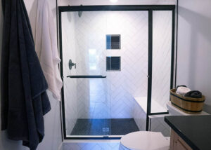 Basement shower with white tile
