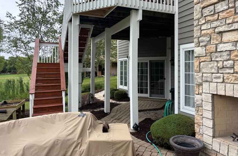 Before: Patio Under the Steps